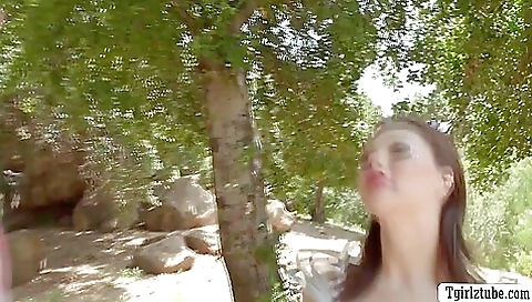 Big ass brunette enjoys her outdoor sex with her black cock