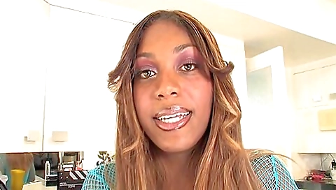 Tattooed ebony beauty riding a huge cock in the studio