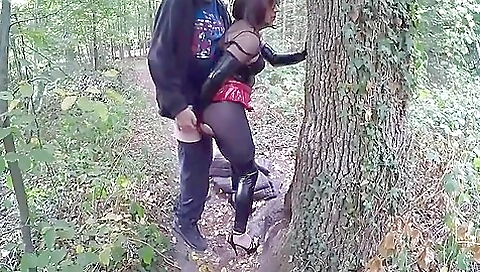 Brunette girl gets anal rubbed with latex in outdoor