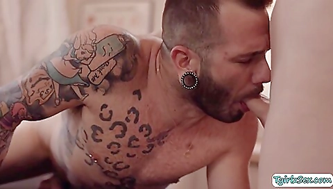 Sexy blonde massage therapist gives her client a foot-fucking